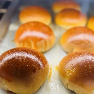 a tray of freshly baked buns
