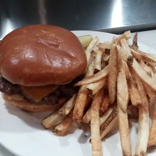 Hand pattied cheeseburger and hand cut fries.