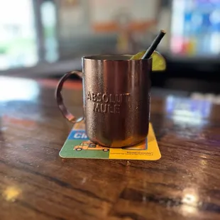 a mug with a drink in it