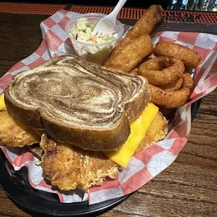 Fish platter with onion rings and slaw. One of the best in the city!