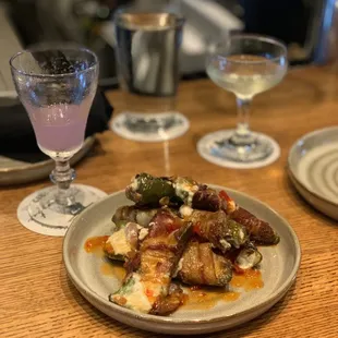 The half drink to the left is the &quot;Valhalla&quot;, then the &quot;Tyspy Gypsy,&quot; In the center, our jalapeño poppers.