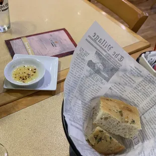 They bring you bread and olive oil with garlic. Gray place to eat at if you enjoy good food.