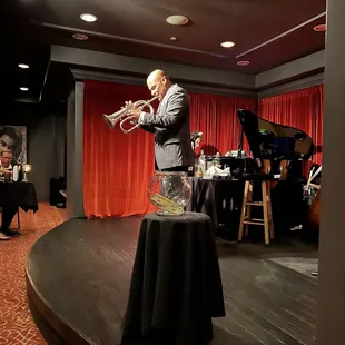 a man playing a trumpet