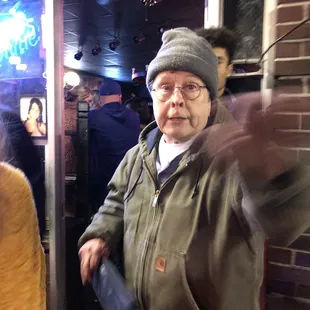 a man in a hat and glasses