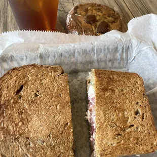 The Central Avocado, Turkey, Red Onion, Bacon, Raspberry Preserves, Goat Cheese, Pressed on our signature wild rice bread!