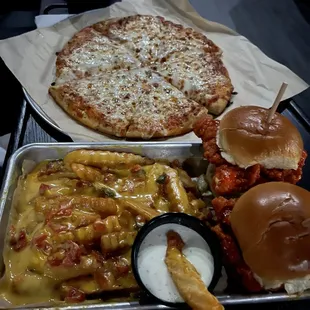 Buffalo sliders and loaded cheese fries / cheeses pizza.