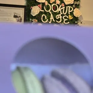 Assorted handmade macarons: mango passionfruit, taro, cookies cream, earl gray tea, green tea, and cotton candy.