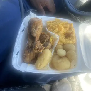 Fried chicken legs, butter potatoes, and Mac and cheese