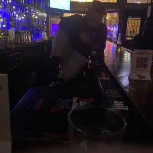 a man sitting at a bar