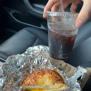 Cold brew and Asiago sausage egg and cheese