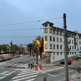 a view of a city street at dusk