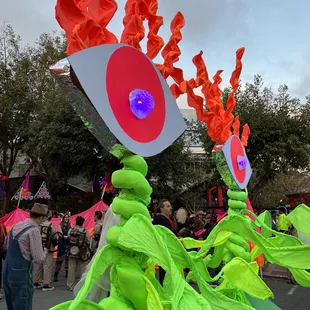 a group of people walking in a parade