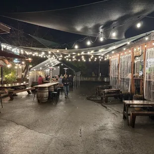 Back patio with rain covers and heaters!
