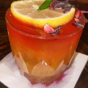 a drink with a slice of lemon