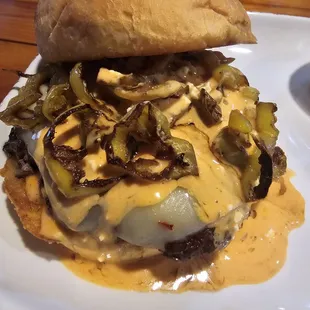 a cheeseburger on a plate