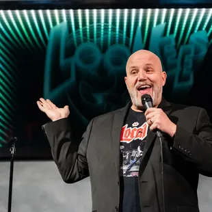 a man holding a microphone