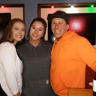 three people posing for a picture