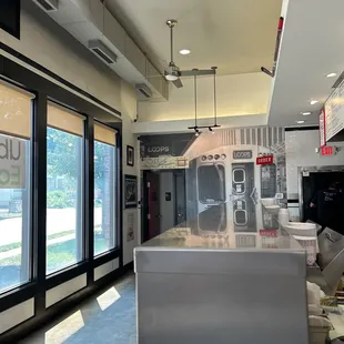 a commercial kitchen with stainless steel counter tops