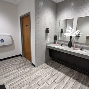 Women&apos;s bathroom with baby changing station