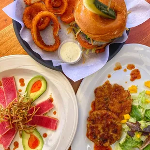 Seared ahi avocado, jalapeño crab cakes, and burgers.