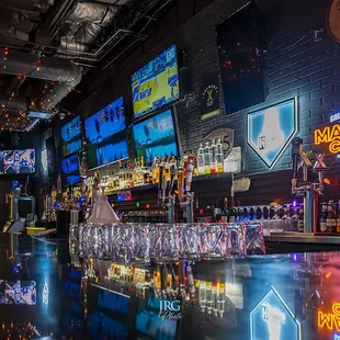 A full bar with all the TVs you will ever need