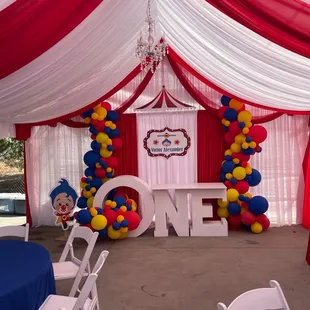 Tent, draping , back drop , tables , One table , balloons