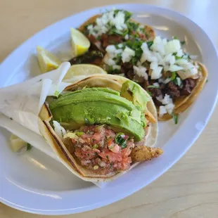 Fish, al pastor, and lengua tacos.