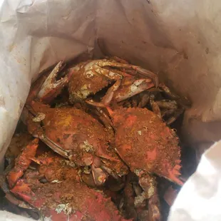 a crab in a paper bag