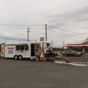 a food truck parked in a parking lot