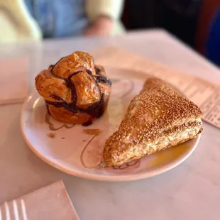 Chocolate babka (left) and spinach &amp; feta boureka (right)