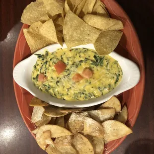 The spinach and artichoke dip...$9...tastes like melted cheese squares with spinach. No artichokes. Little flavor.