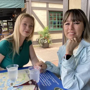 two women sitting at a table