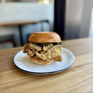 Pecking House Aug 2024 - Classic Sando, fried chicken, PH special sauce, caramelized onions, soy pickles, brioche bun