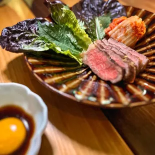 Nathan Matkowsky, May 2023 - Grilled strip loin, house made kimchi, red gems, egg yolk tare