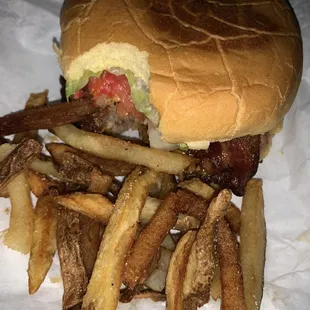 Lords burger special with added cheese and bacon