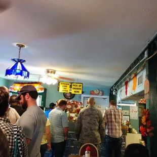 Long line at counter to order.