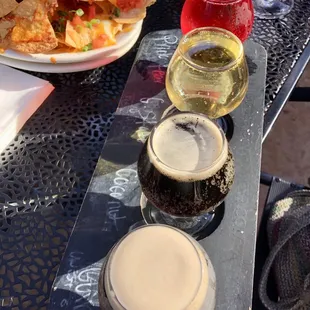Tasting flight. 2 ciders and two dark beers. :9