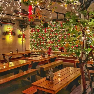 The Heated Winter Wonderland Outdoor Beer Garden featuring a Holiday Ornament Wall!