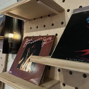 a shelf of vinyl records