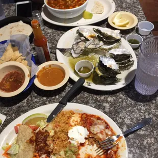 a table full of mexican food