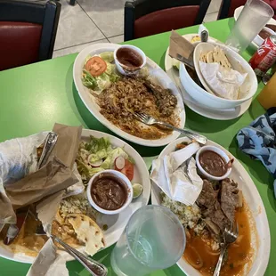 plates of food on a green table