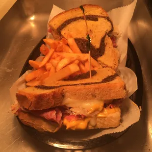 Grilled Reuben with fries