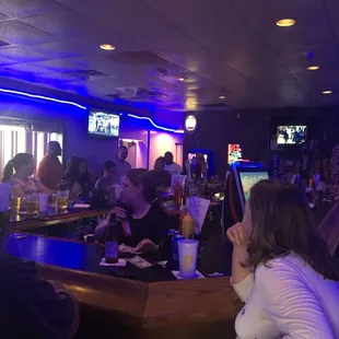 Friends, neighbors, and coworkers winding down after a day at work.