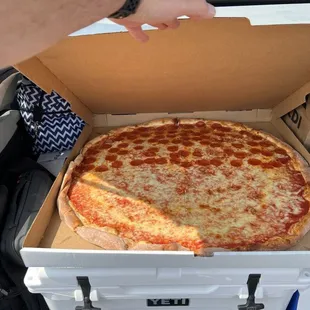 1/2 cheese 1/2 pepperoni pizza taking up rear of a crosstrek!