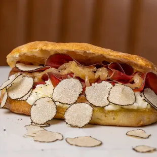 a sandwich on a white plate