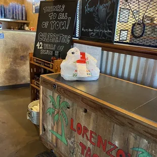 a cart with a bag of tacos