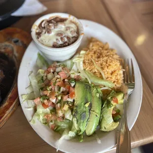 Side of rice and bean with molcajete