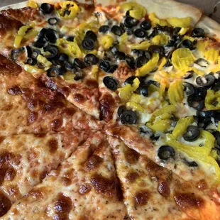 Pizza half cheese half banana peppers and black olives.  (No jalapeño available)