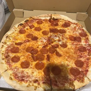 a pepperoni pizza in a box