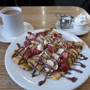 Crepes with strawberry banana and nutella.